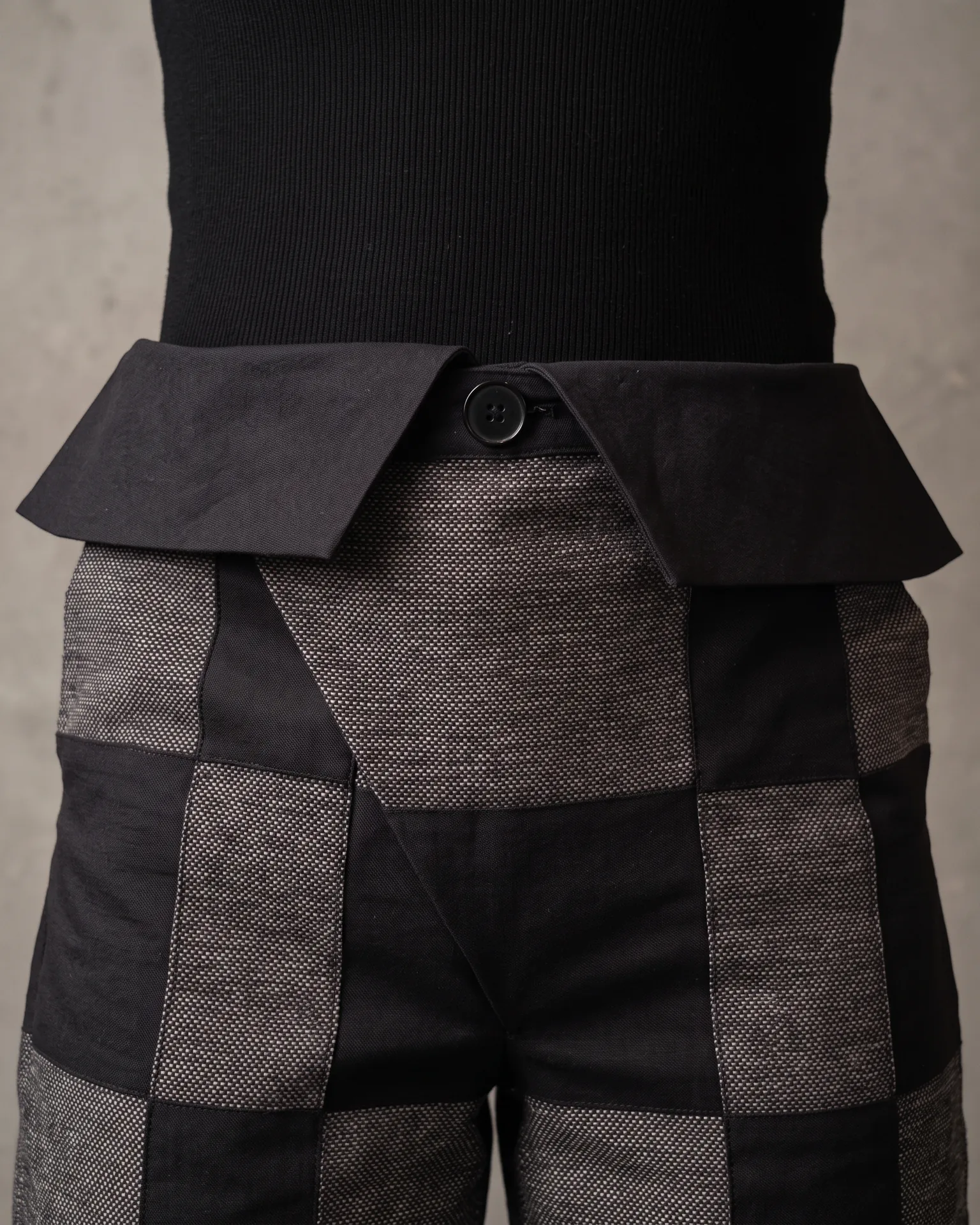 Checkerboard wide trouser, folded waistband detail