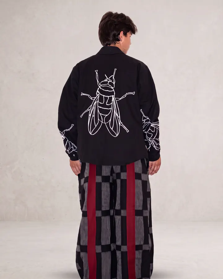 Fly graphic jacket worn from the back