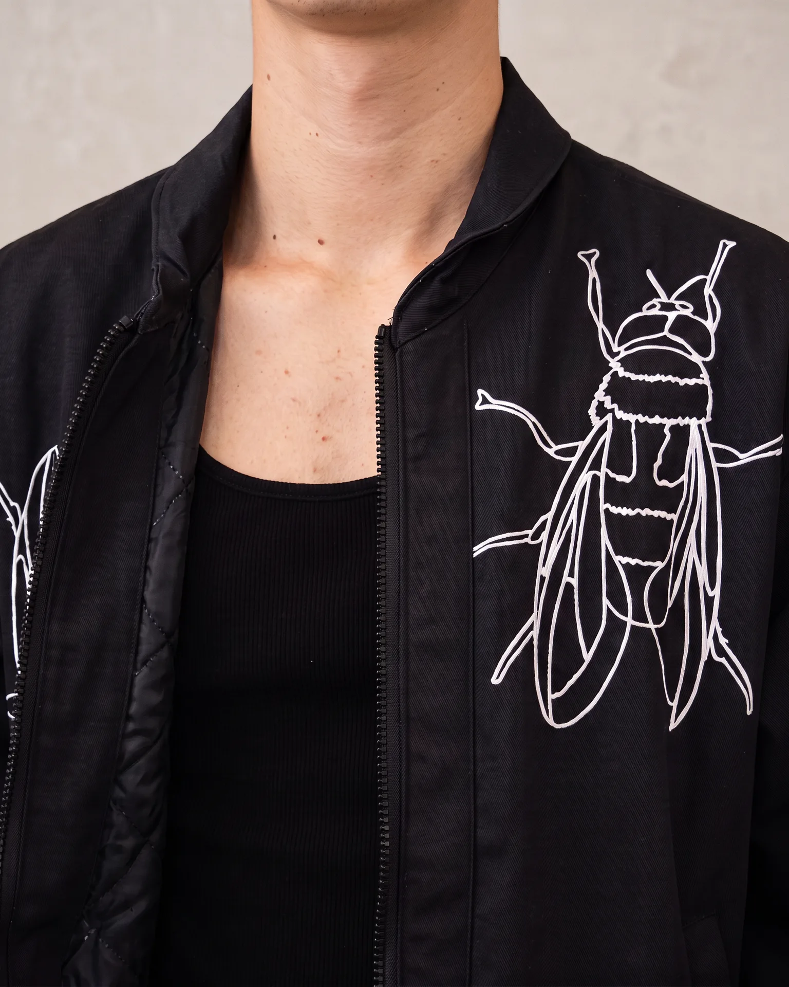 Fly graphic jacket front artwork detail