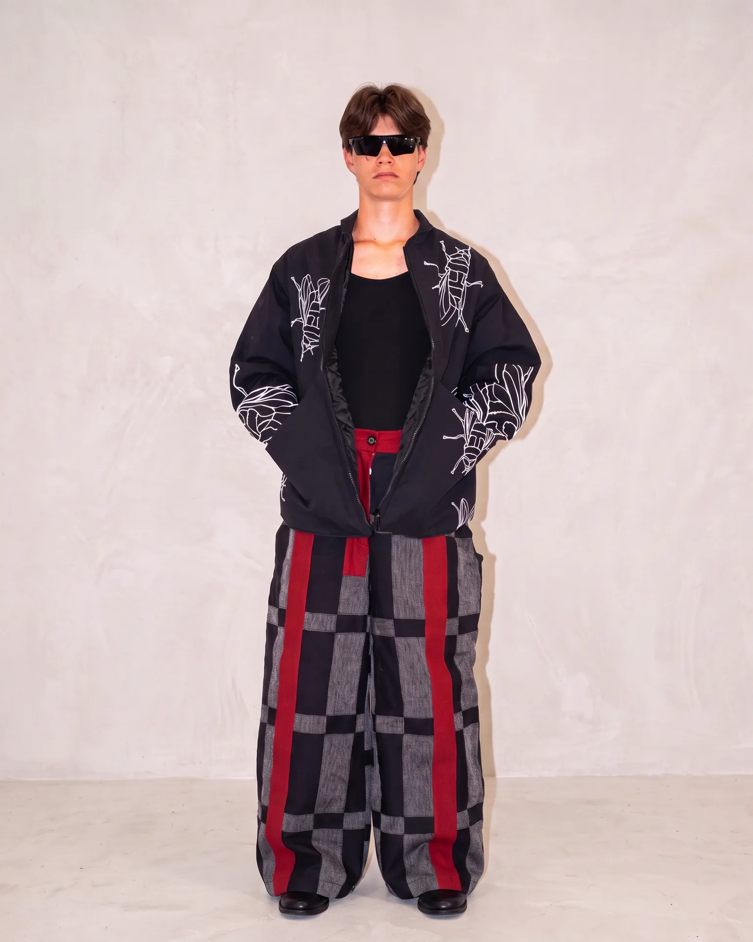 Fly graphic jacket worn from the front