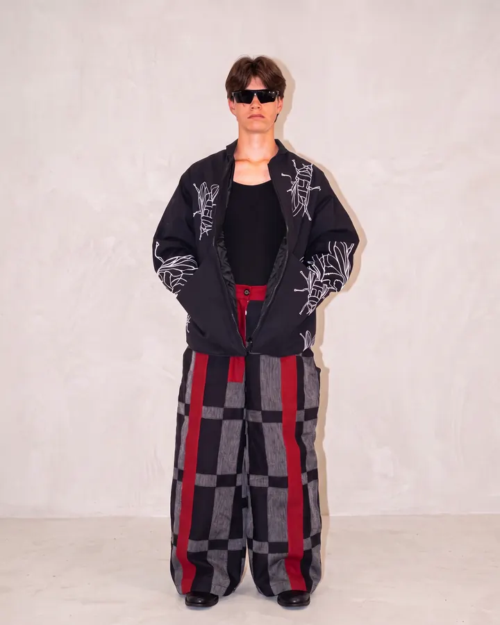 Fly graphic jacket worn from the front