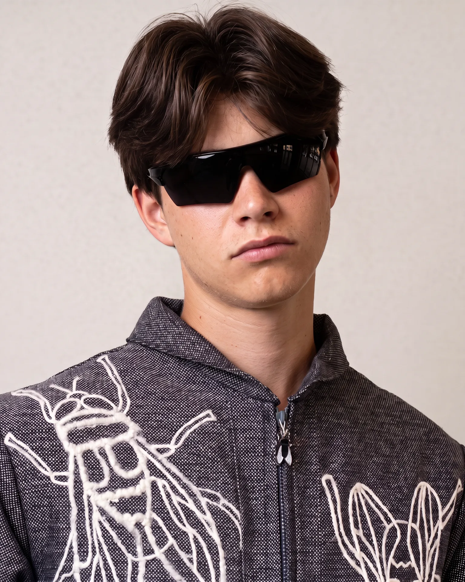 Grey fly jacket collar and front embroidery detail