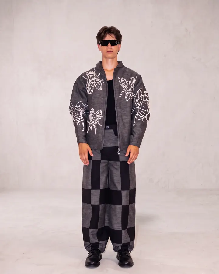 Grey fly jacket worn from the front